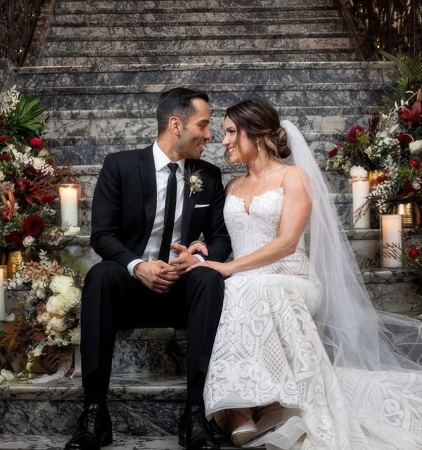 a bride and groom gazing into each others eyes