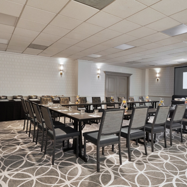 spade meeting room at the marker hotel with conference tables and chairs set up