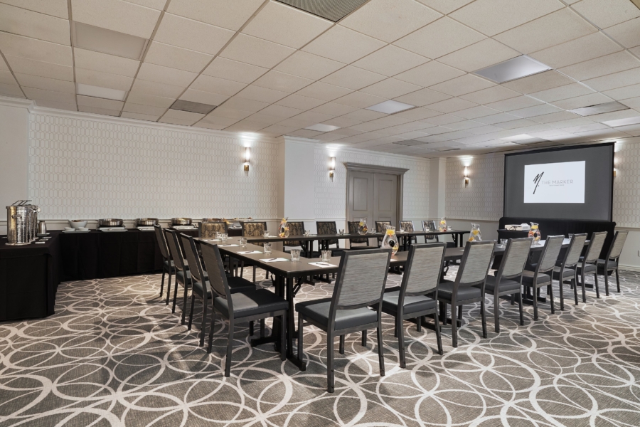 spade meeting room at the marker hotel with conference tables and chairs set up