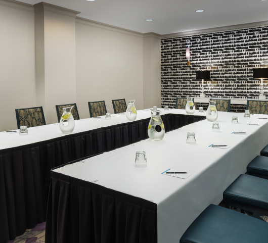 large u shape table used for meetings at the marker