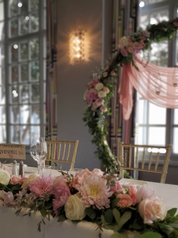 The sweetheart table in the bellevue wedding venue at The Marker