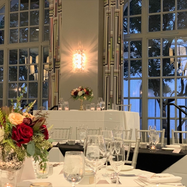 Tables set up for service in a wedding venue at The Marker