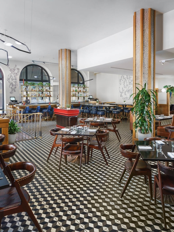 Tratto dining room with lots of chairs and tables at The Marker