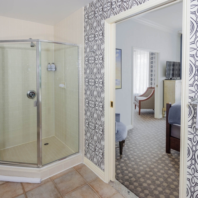 the bathroom and entrance to bedroom in a room at The Marker