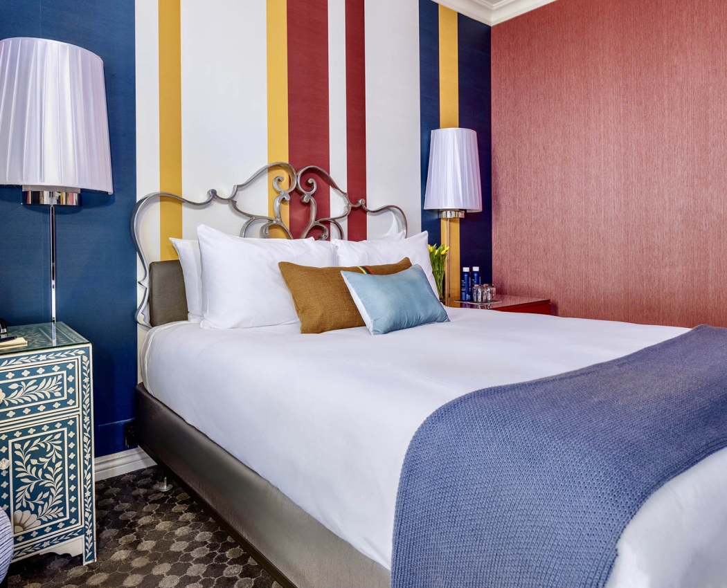 Side view of a bed in a room at The Marker