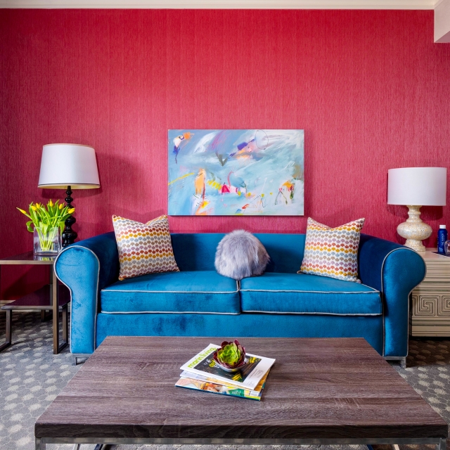 A blue sofa in a room at The Marker